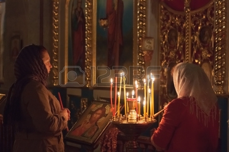 20090501-gomel--may-4-women-pray-at-easter-in-front-of-the-icon-in-belarusian-orthodox-church-on-may-4-2013-i